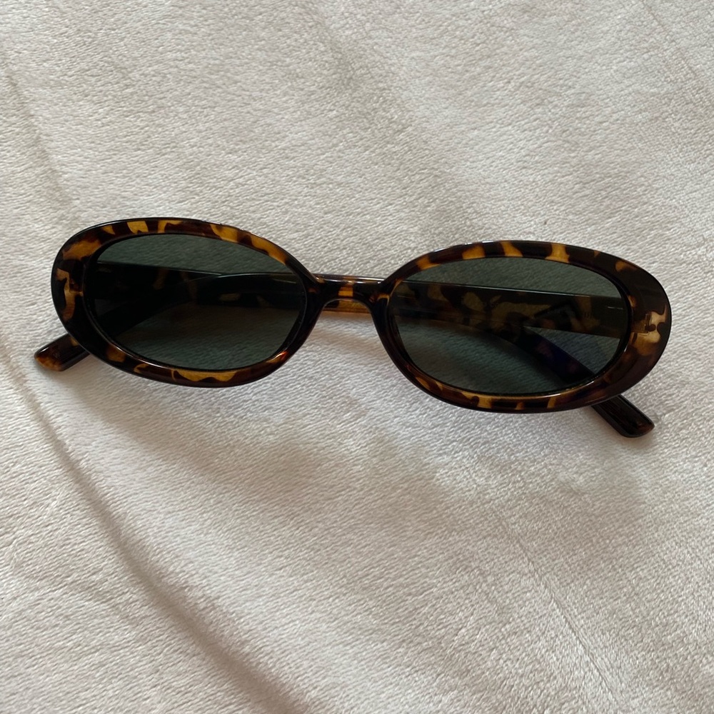 Esprit Cat Eyed Sunglasses that are a brown shade